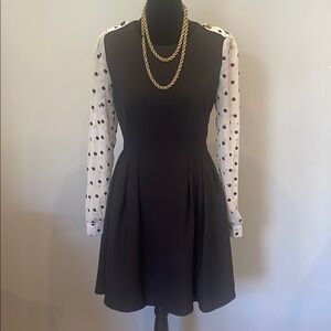 Elegant Black Dress with Polka Dot Sleeves